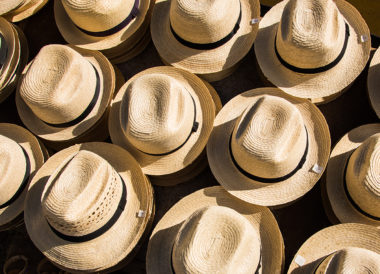 Stacks of straw hats from bird's eye view perspective