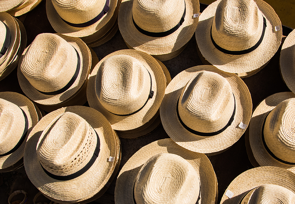 Stacks of straw hats from bird's eye view perspective