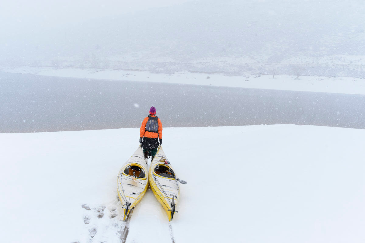 Fort Collins, CO  sea kayaking at Horsetooth Reservoir during a snowstorm.